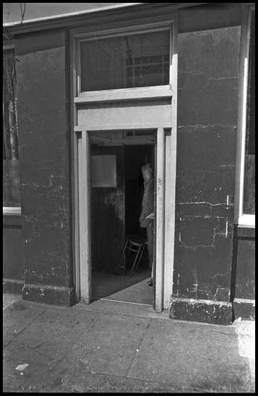 man at the door of the rat
